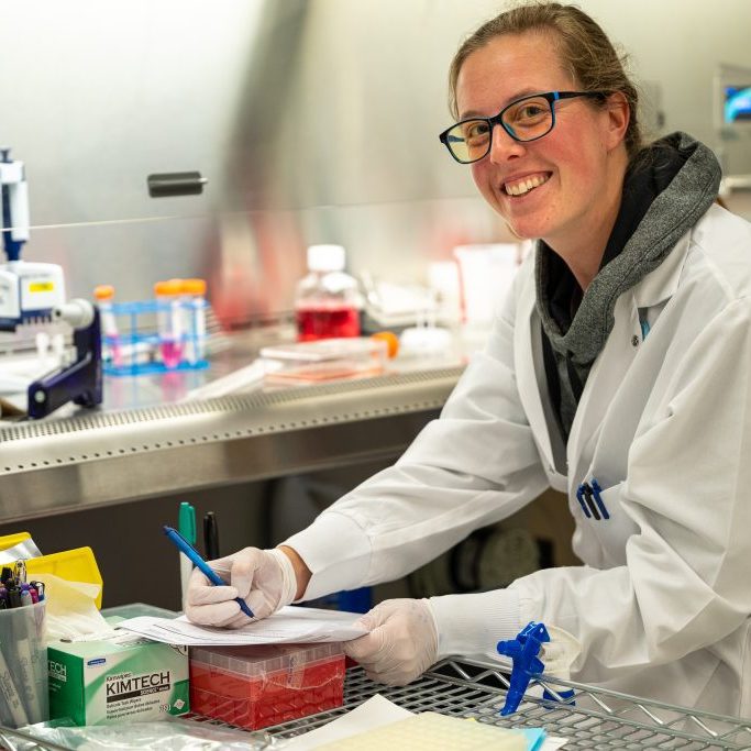 Scientist smiling towards camera